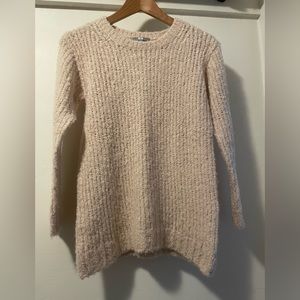 Blush colored ribbed knit sweater by Uniqlo